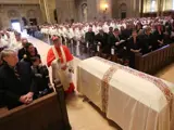 A picture of a funeral in a Catholic church - this church is not Saint Teresa's Upholland